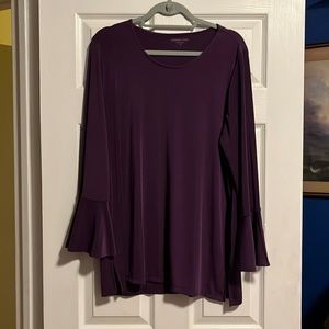 Woman’s purple tunic with bell sleeves